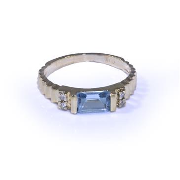 Forever Diamonds Emerald Cut Blue Topaz Ring in 10kt Gold