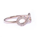 0.25ct TDW. Diamond Infinity Ring in 14kt Rose Gold