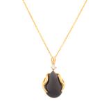 Onyx Diamond Pendant in 14kt Gold