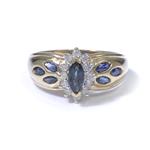 0.25ct TDW. Blue Sapphire in a Diamond Halo Ring in 10kt Gold