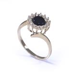 Halo Style Diamond and Onyx Ring in 14kt Gold 