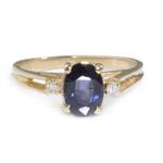 Forever Diamonds Oval Cut Sapphire Accent Diamond Ring in 14kt Gold