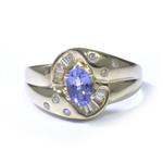 Oval Cut Tanzanite Diamond 0.55ct TDW. 14kt Gold Ring