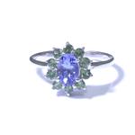 Oval Cut Tanzanite in Peridot Flower Halo 14kt White Gold Ring